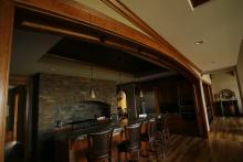arched casing-luxury bar-stone fireplace 